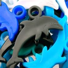 Colorful Dolphin incentive tokens in teal, blue, black, and white for classroom rewards.