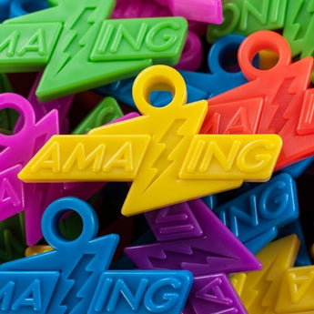 Amazing Tokens by Fitness Finders: Brightly colored lightning bolt tokens with Amazing text, student classroom and fitness awards