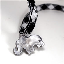 Silver elephant incentive token on a black and white patterned ribbon, designed to motivate students and celebrate achievements in classrooms and fitness programs.
