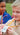 Two children outdoors, with Ez Scan QR code card