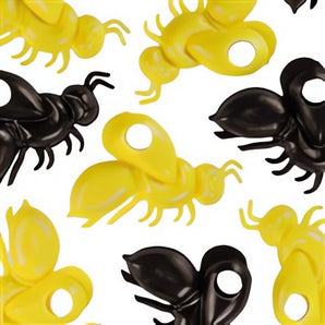 Colorful assortment of yellow and black plastic bee charms, ideal for motivating students in spelling competitions and enhancing classroom decor.